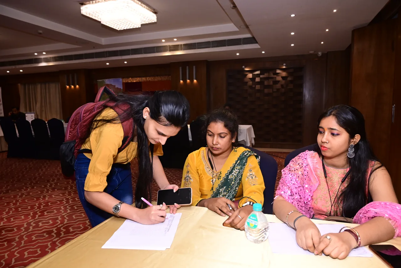 Students exploring education options with an adviser at an ICC event